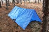 Knowing how to make a simple A-frame tarp shelter is a basic survival skill. 