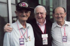 O'Neil Poe, left of Reserve, LA, poses with two of his comrades at the National WWII Museum. Poe, a member of Company B, 507th, 82nd Airborne, made three combat jumps in WWII