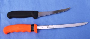 The Forshner six-inch boning knife with a flexible blade is a fine tool for filleting fish; the Cutco shown below it has a seven-to-nine inch adjustable blade. (Pantenburg photo)