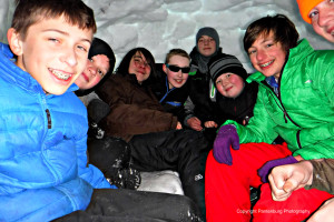 These Boy Scouts crowded into an igloo during a winter campout. They have bragging rights.