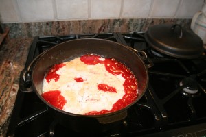 This Dutch oven cobbler uses canned fruit and cake mix to create a tasty dessert.