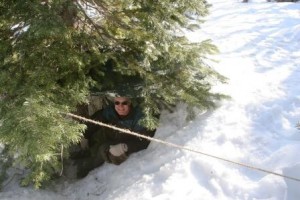 Troop 18 Scoutmater Phil Brummett made a great tree well shelter, which I was happy to inspect!